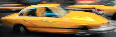 yellow taxi with motion blur cropped